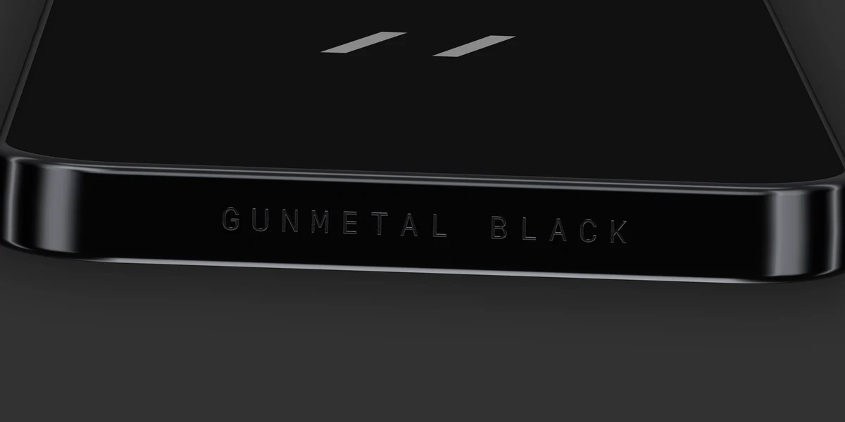 Gunmetal black finish, its name engraved under the band
