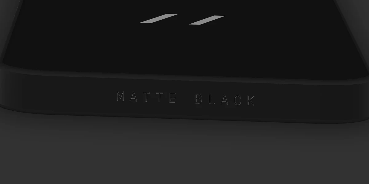 Matte black finish, its name engraved under the band
