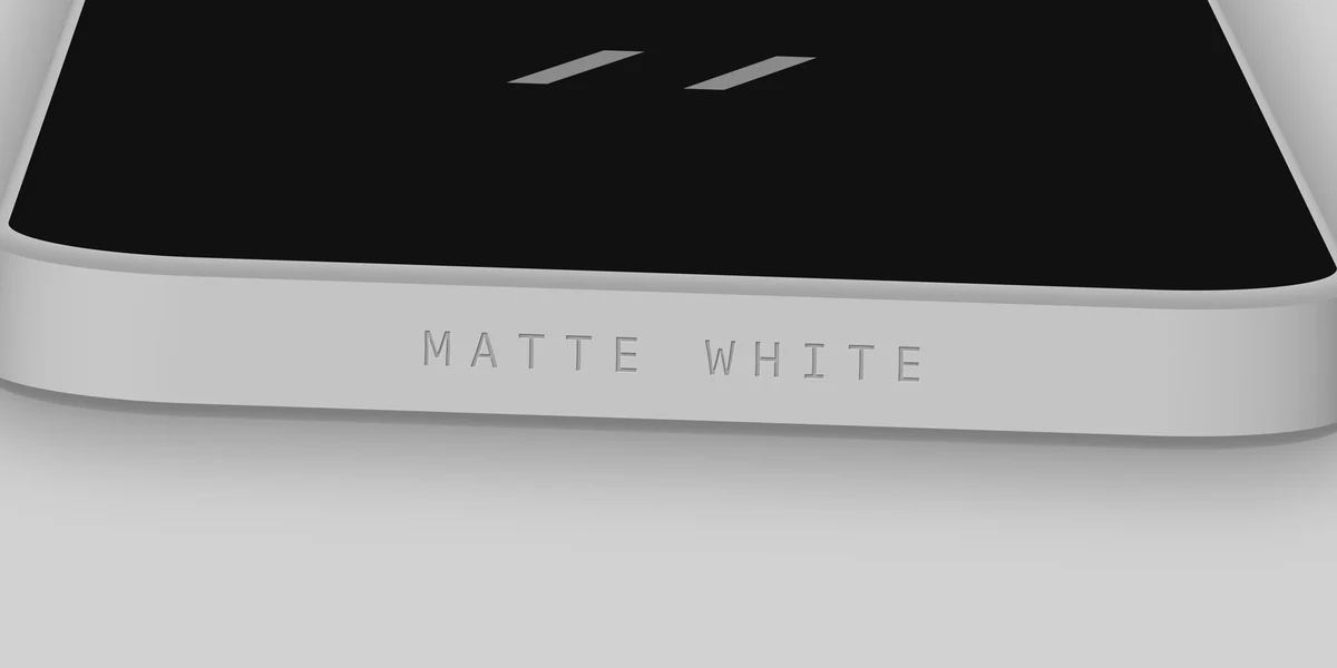 Matte white finish, its name engraved under the band